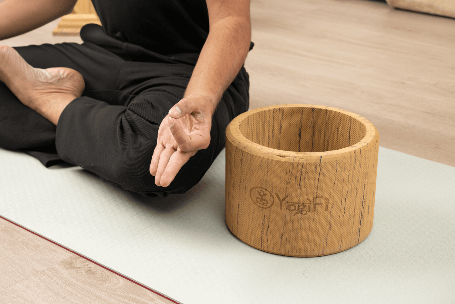 Close-up of a textured yoga wheel, showcasing its sturdy design.